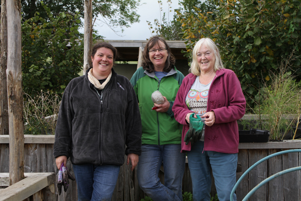 Three women in a garden
